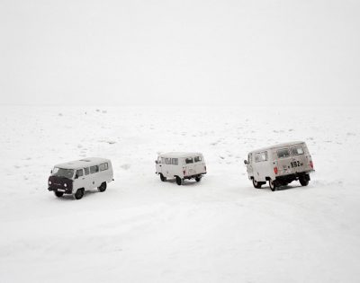 Taxis cross the frozen Lena River, Yakutsk, Far East Russia, November 2004