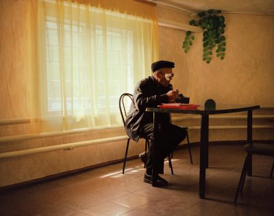 A man eats lunch in a roadside cafe, Altai Mountains, Western Siberia, June 2005