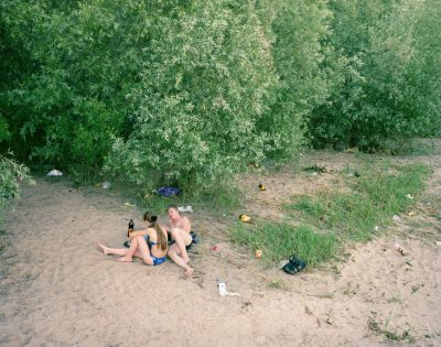 Young lovers on the banks of the Volga River, Astrakhan, Volga, June 2005